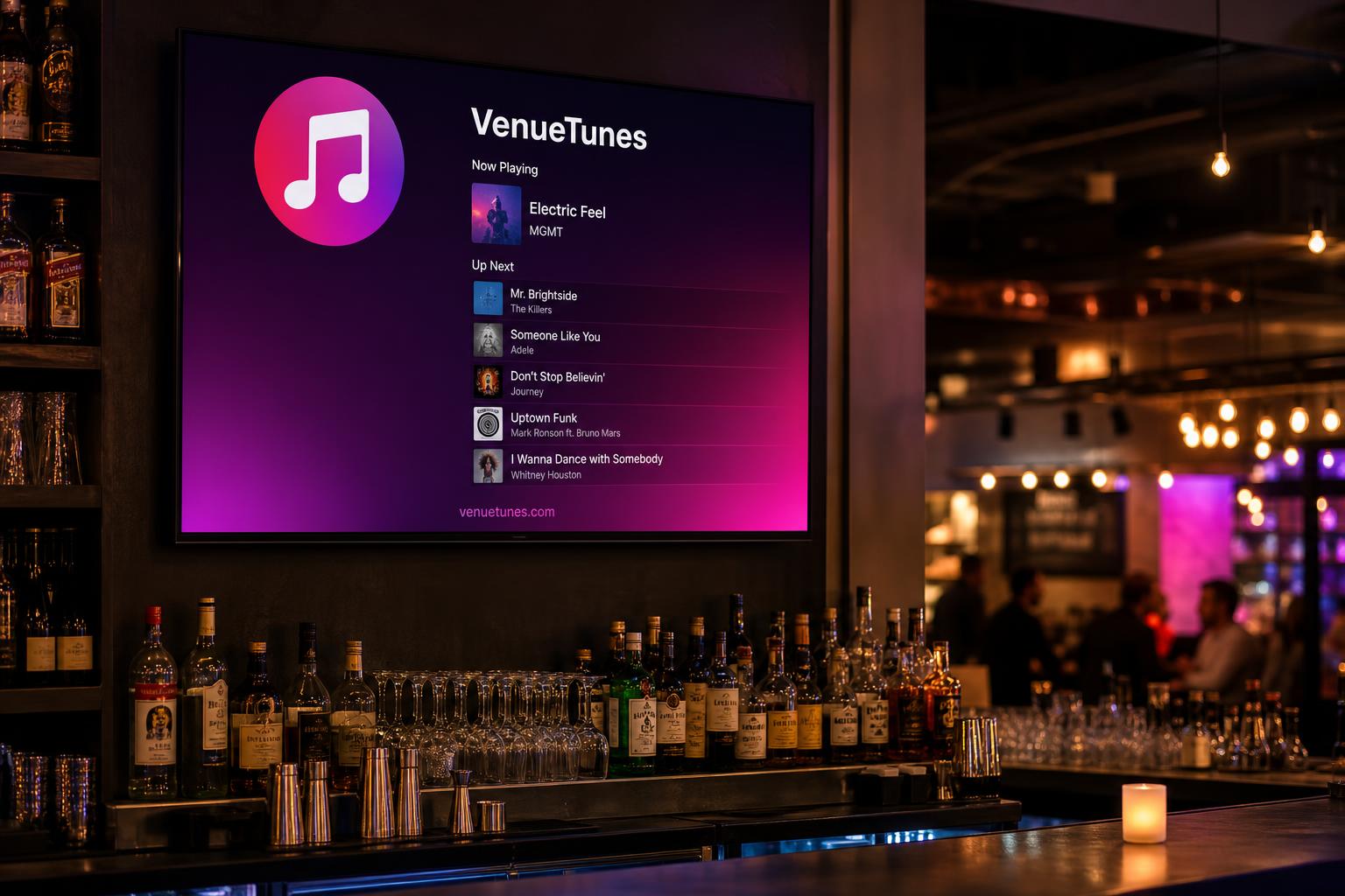Upscale sports bar with VenueTunes display above the bar at peak hours.